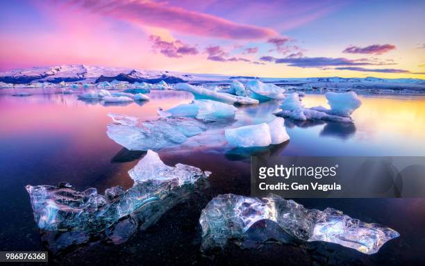 ice floes on jokulsarlon lake in vatnajokull national park, iceland. - iceland stock pictures, royalty-free photos & images