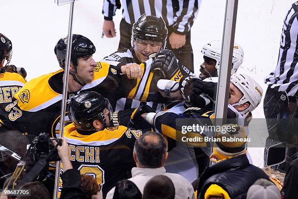 Zdeno Chara of the Boston Bruins punches Paul Gaustad of the Buffalo Sabres in Game Six of the Eastern Conference Quarterfinals during the 2010 NHL...