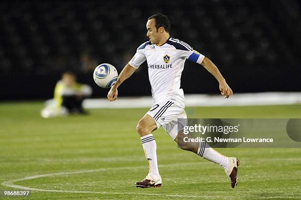 Landon Donovan of the Los Angeles Galaxy paces the ball during their MLS match against the Kansas City Wizards on April 24, 2010 at Community America...