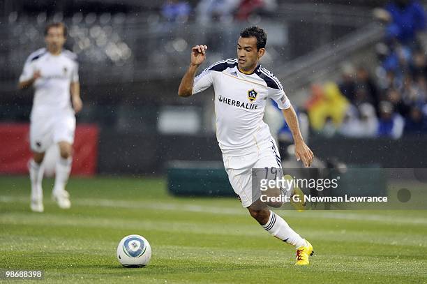 Juninho of the Los Angeles Galaxy paces the ball on the attack against the Kansas City Wizards during their MLS match on April 24, 2010 at Community...