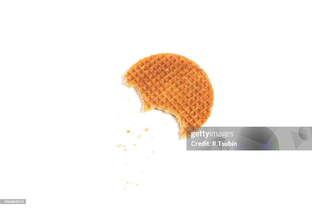 Food waffle with caramel crumbs isolated on white background