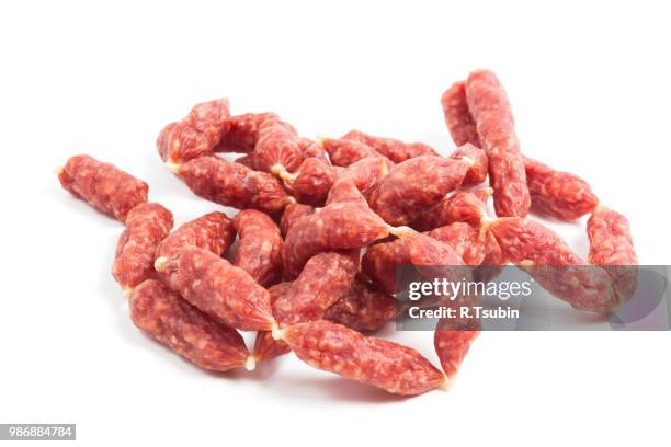 mini sausages on white background - wurst stock pictures, royalty-free photos & images