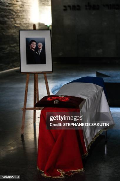 The coffins of women's rights icon French politician and Holocaust survivor Simone and her husband Antoine Veil are drapped in the French national...