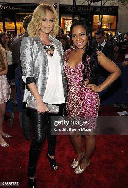 Charlize Theron and Ashanti arrive at Conde Nast Media Group's Fifth Annual Fashion Rocks at Radio City Music Hall on September 5, 2008 in New York...