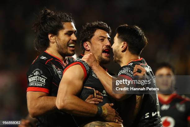 Anthony Gelling of the Warriors celebrates after scoring a try during the round 16 NRL match between the New Zealand Warriors and the Cronulla Sharks...
