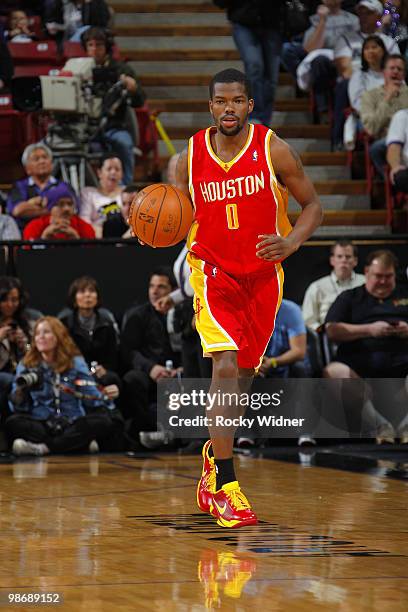 Aaron Brooks of the Houston Rockets takes the ball upcourt during the game against the Sacramento Kings at Arco Arena on April 12, 2010 in...