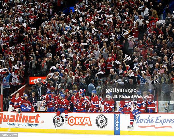 Members of the Montreal Canadiens and fans celebrate the third period goal from Tomas Plekanec in Game Six of the Eastern Conference Quarterfinals...