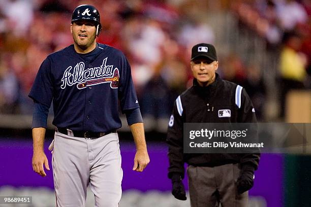 Troy Glaus of the Atlanta Braves throws reacts to being called out by umpire Dan Iassogna against the St. Louis Cardinals at Busch Stadium on April...