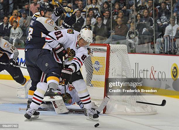 Marcel Goc of the Nashville Predators ties up Marian Hossa of the Chicago Blackhawks in Game Six of the Western Conference Quarterfinals during the...