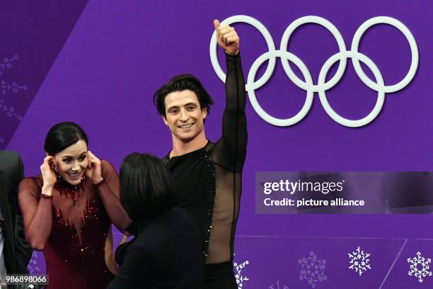 February 2018, South Korea, Gangneung: Olympics, Figure Skating, Ice Dance Free, Gangneung Ice Arena: Canada's Tessa Virtue and Scott Muir celebrate...