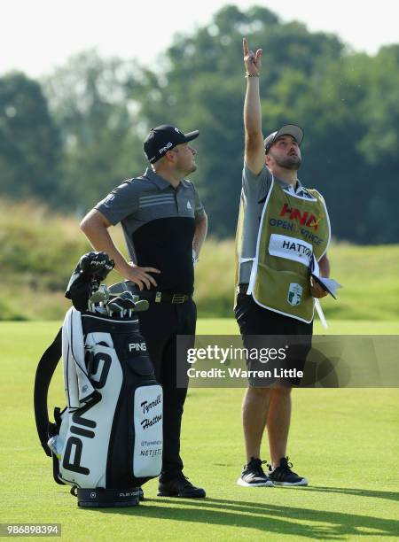 Tyrrell Hatton of England plays second shot on the 14th hole during the second round of the HNA Open de France at Le Golf National on June 29, 2018...