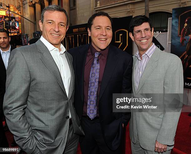 Disney Studios CEO Robert Iger, director/executive producer Jon Favreau and Chairman of The Walt Disney Studios Rich Ross arrive at the world...