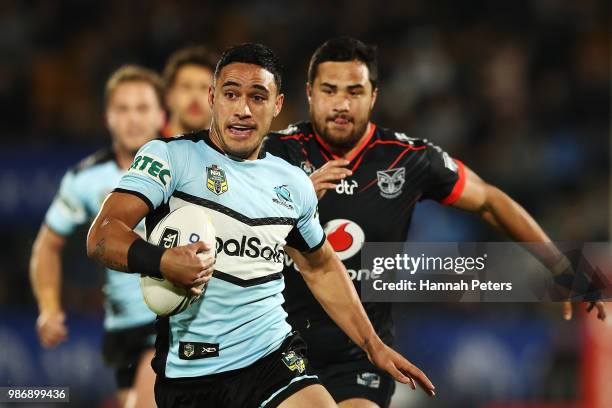 Valentine Holmes of the Sharks makes a break during the round 16 NRL match between the New Zealand Warriors and the Cronulla Sharks at Mt Smart...