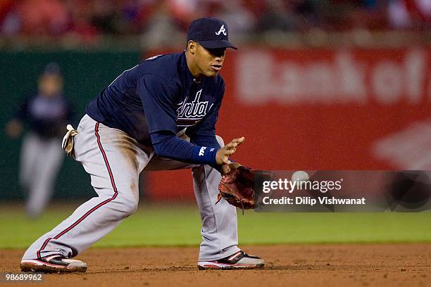 Yunel Escobar of the Atlanta Braves fields a groundball against the St. Louis Cardinals at Busch Stadium on April 26, 2010 in St. Louis, Missouri.