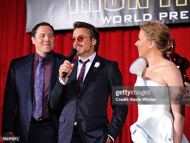 Director/executive producer Jon Favreau, actor Robert Downey Jr. And actress Scarlett Johansson speak at the world premiere of Paramount Pictures and...