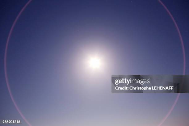 the marne. haute-marne. lake of der in winter. site of chantecoq of night. the moon shines in the sky. optical halation around the moon. - optical phenomenon halo stock pictures, royalty-free photos & images