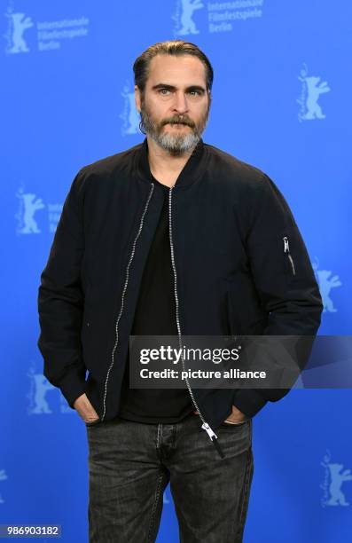 February 2018, Germany, Berlin, Berlinale, photocall, 'Don't Worry, He Won't Get Far on Foot': Actor Joaquin Phoenix. The film runs in the...