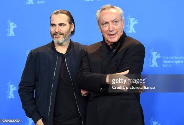 February 2018, Germany, Berlin, Berlinale, photocall, 'Don't Worry, He Won't Get Far on Foot': Actors Joaquin Phoenix and Udo Kier. The film runs in...