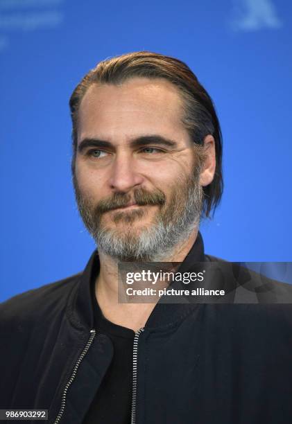 February 2018, Germany, Berlin, Berlinale, photocall, 'Don't Worry, He Won't Get Far on Foot': Actor Joaquin Phoenix. The film runs in the...