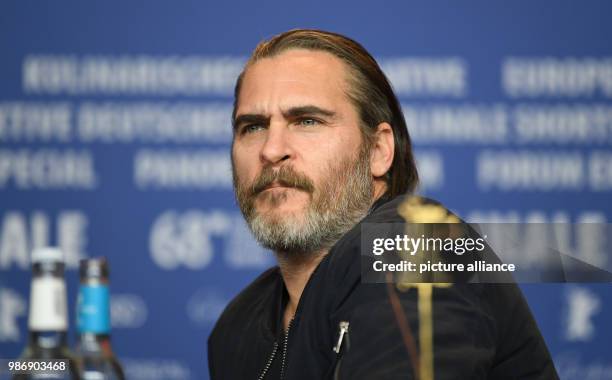 February 2018, Germany, Berlin, Berlinale, photocall, 'Don't Worry, He Won't Get Far on Foot': Actor Joaquin Phoenix. The film runs in the...