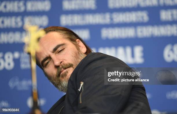 February 2018, Germany, Berlin, Berlinale, photocall, 'Don't Worry, He Won't Get Far on Foot': Actor Joaquin Phoenix. The film runs in the...
