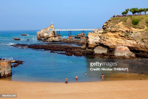 france, aquitaine, pyrenees atlantiques (64) , basque country, biarritz, port vieux beach and rocher de la vierge or the virgin's rocks - rocher stock pictures, royalty-free photos & images
