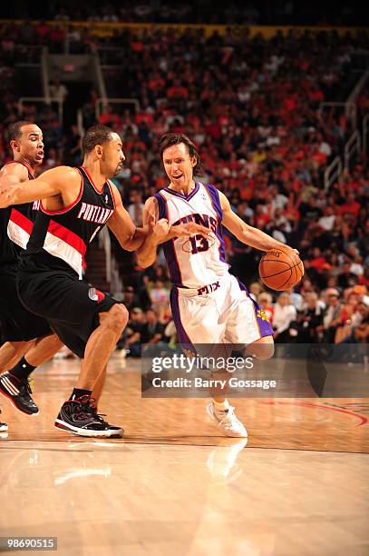 Steve Nash of the Phoenix Suns drives against Juwan Howard of the Portland Trail Blazers in Game Five of the Western Conference Quarterfinals during...