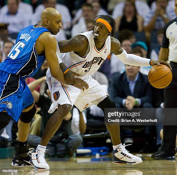 Gerald Wallace of the Charlotte Bobcats tries to back down Vince Carter of the Orlando Magic in Game Four of the Eastern Conference Quarterfinals...