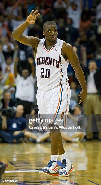 Raymond Felton of the Charlotte Bobcats reacts after hitting a 3-point shot as time expired in the first quarter against the Orlando Magic in Game...