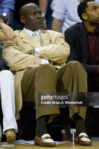 Charlotte Bobcats principal owner Michael Jordan watches the action against the Orlando Magic in Game Four of the Eastern Conference Quarterfinals...
