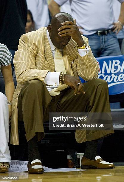 Charlotte Bobcats principal owner Michael Jordan reacts as time winds down against the Orlando Magic in Game Four of the Eastern Conference...