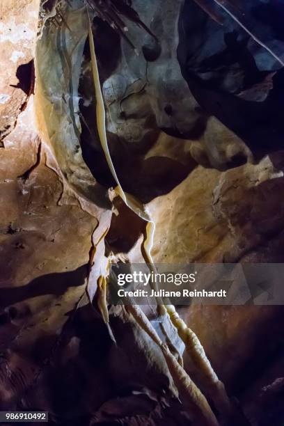 flowstones - scary-cave stock pictures, royalty-free photos & images