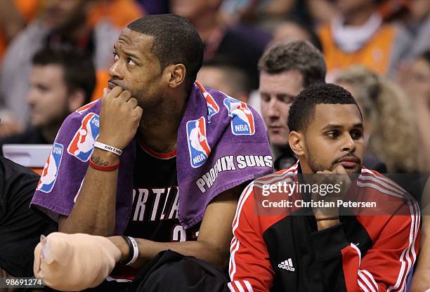 Marcus Camby and Patrick Mills of the Portland Trail Blazers react on the bench during Game Five of the Western Conference Quarterfinals of the 2010...