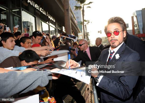 Actor Robert Downey Jr. Signs autographs as he arrives at the world wide premiere of "Iron Man 2" Premiere held at the El Capitan Theatre on April...
