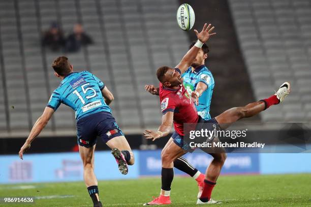 Blues Matt Duffie and Reds Eto Nabuli compete for the hgh ball during the round 17 Super Rugby match between the Blues and the Reds at Eden Park on...