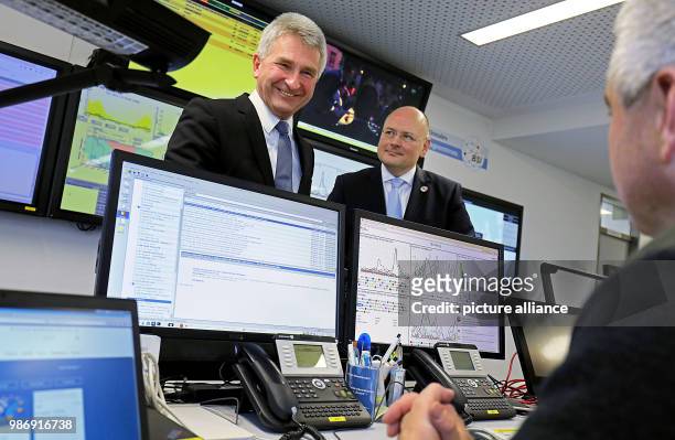 February 2018, Germany, Bonn: Arne Schoenbohm , President of the Bundesamt für Sicherheit in der Informationstechnik and Andreas Pinkwart , Minister...