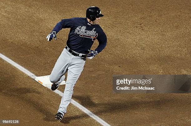 Chipper Jones of the Atlanta Braves runs the bases against the New York Mets on April 25, 2010 at Citi Field in the Flushing neighborhood of the...