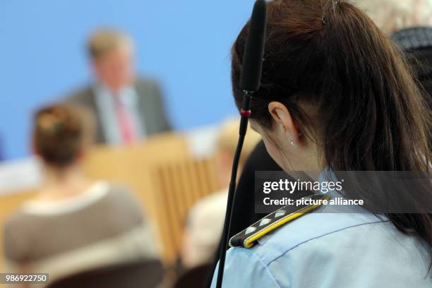 February 2018, Germany, Berlin: A soldier of the Federal Armed Forces follows press conference by the Parliamentary Commissioner for the Federal...