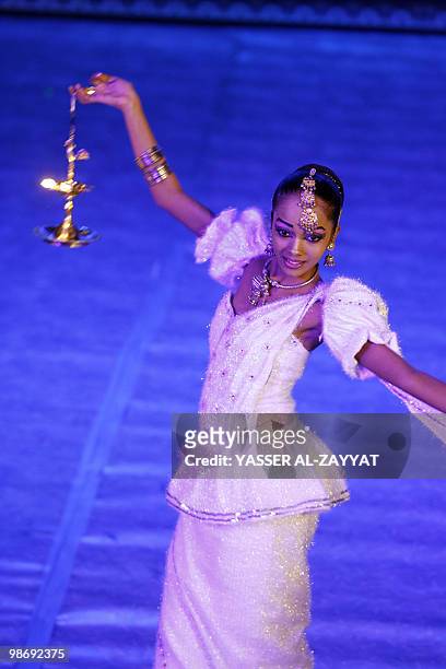 Dancer from the Sri Lankan troupe of the "Chandana Wickramasinghe and the Dancers Guild" presents a dance during a show entitled "Sri Lak Rangana", a...