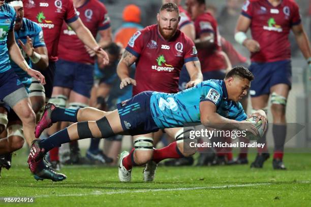 Blues Caleb Clarke dives in for a try during the round 17 Super Rugby match between the Blues and the Reds at Eden Park on June 29, 2018 in Auckland,...