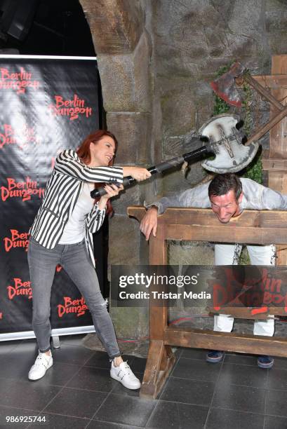 Kerstin Merlin and her friend Christian Gentner during the 'Horror Hour - Licht aus, Alptraum an!' premiere at Berlin Dungeon on June 28, 2018 in...