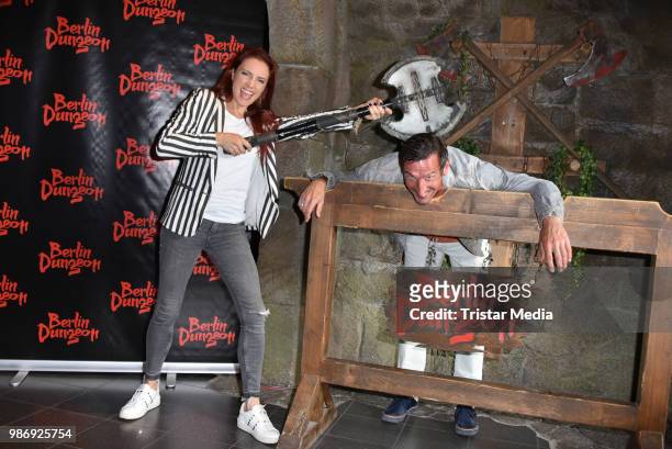 Kerstin Merlin and her friend Christian Gentner during the 'Horror Hour - Licht aus, Alptraum an!' premiere at Berlin Dungeon on June 28, 2018 in...