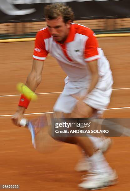 French Julien Benneteau serves a ball to US Sam Querrey during their ATP Tennis Open match in Rome on on April 26, 2010 in Rome. AFP PHOTO / ANDREAS...
