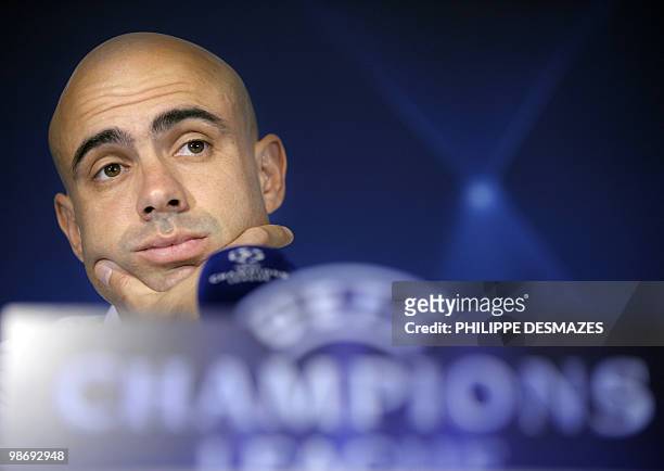 Lyon's Brazilian defender Cristiano Marques smiles during a press conference on April 26, 2010 at the Gerland stadium in Lyon, on the eve of the...