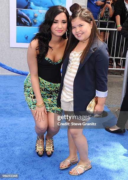 Demi Lovato and sister Madison De La Garza attends the "Oceans" Los Angeles Blue Carpet Premiere at the El Capitan Theatre on April 17, 2010 in...