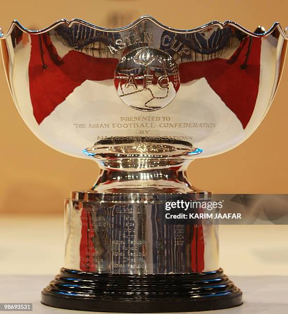 Picture taken on April 22, 2010 shows the AFC trophy on the eve of the 2011 Asian Cup draw in the Qatari capital Doha. After a maze of qualifiers, 16...