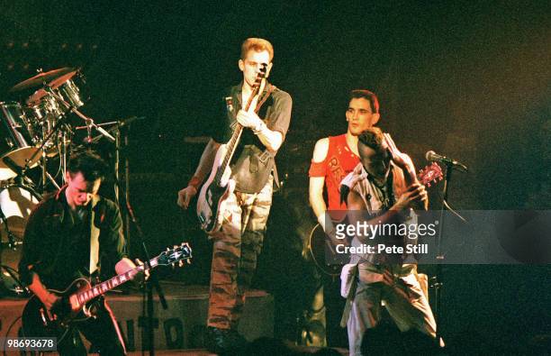 Vince White, Paul Simonon, Nick Sheppard and Joe Strummer of The Clash perform on stage at the Brixton Academy on March 8th, 1984 in London, England.