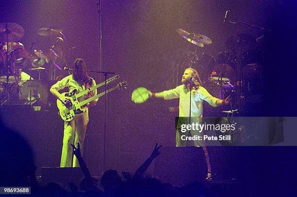 Mike Rutherford and Phil Collins and Tony Banks of Genesis perform on stage at the Playhouse Theatre in Edinburgh, Scotland, on January 14th, 1977.