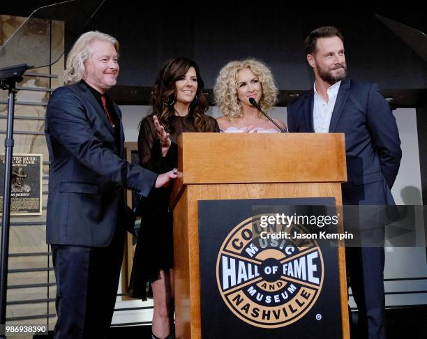 Phillip Sweet, Karen Fairchild, Kimberly Schlapman and Jimi Westbrook of Little Big Town speak onstage during the Country Music Hall of Fame and...