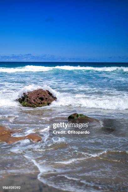 mexican beach and waves crashing in - establishing-shot stock pictures, royalty-free photos & images